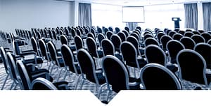 Seminar room filled with empty chairs