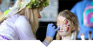 A child getting their face painted