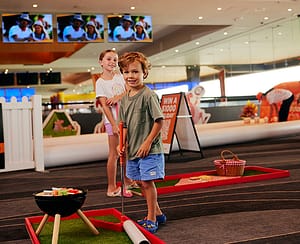 Kids playing mini golf at the Ingenia Fun Zone