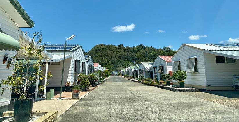 View down a street at Banksia Waters by Hometown Australia