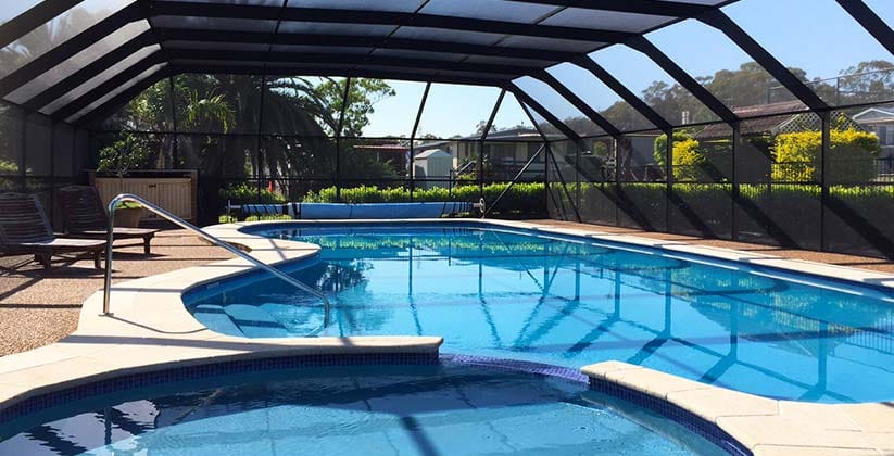 outside pool and spa under shade cloth